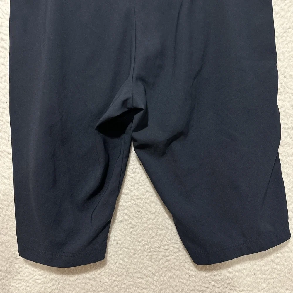 Nike Dri-Fit Sportswear‎ Shorts Size M Navy Featuring Green Stripes on the Sides